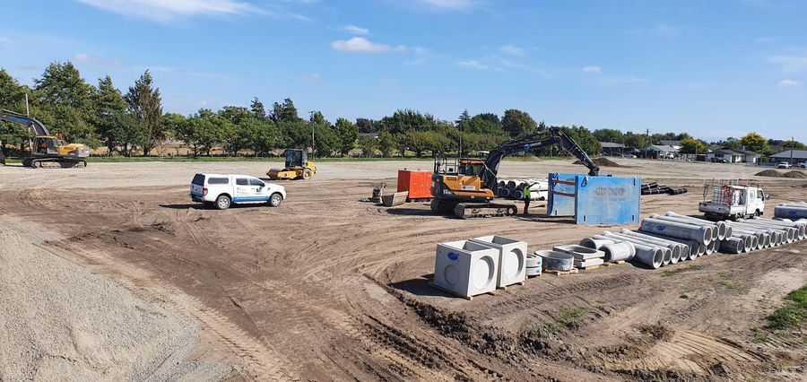 Concrete chambers and pipe staged on a Canterbury civil drainage project