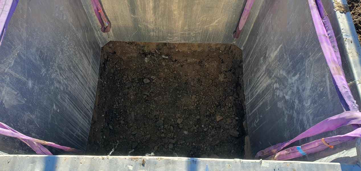 Pressure sewer tank install under way on a Christchurch section