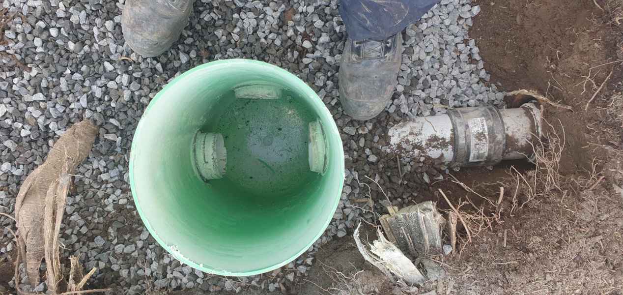 Failed section of old drain cut out and replaced with a new gully bowl in Christchurch
