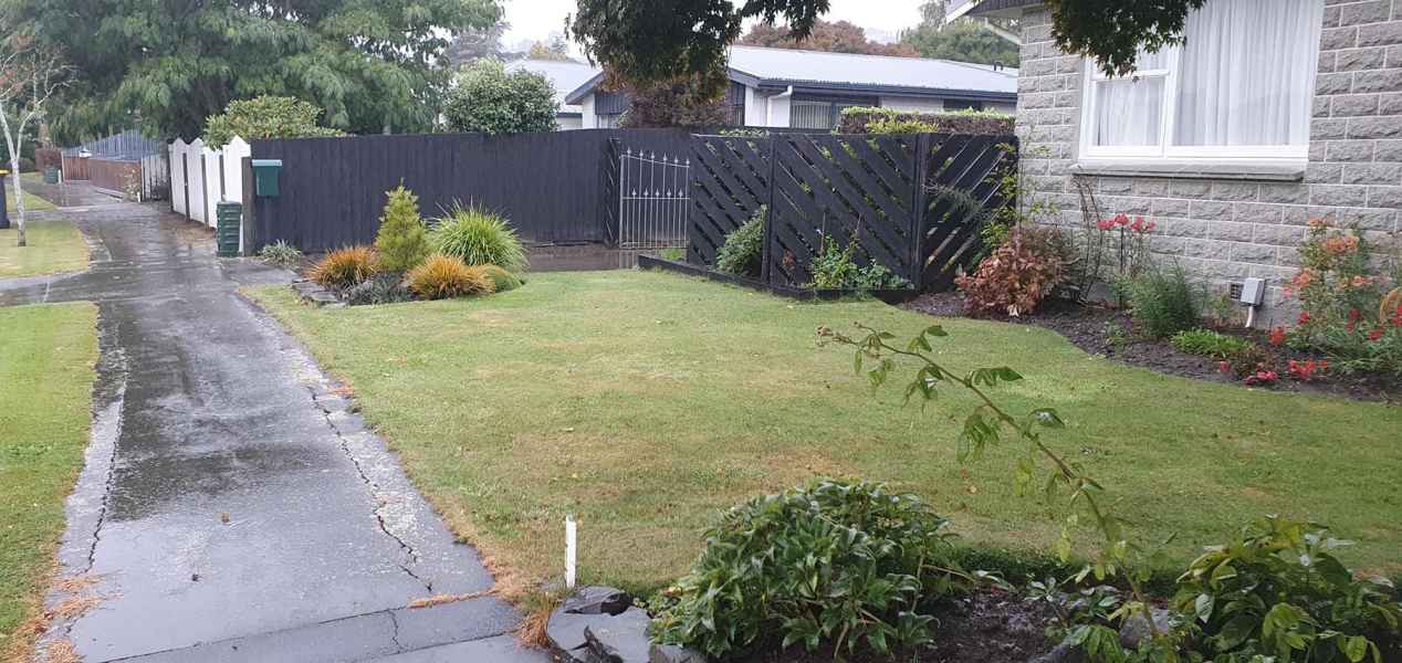 Lawn and path left tidy after earthquake drainage repairs in Canterbury