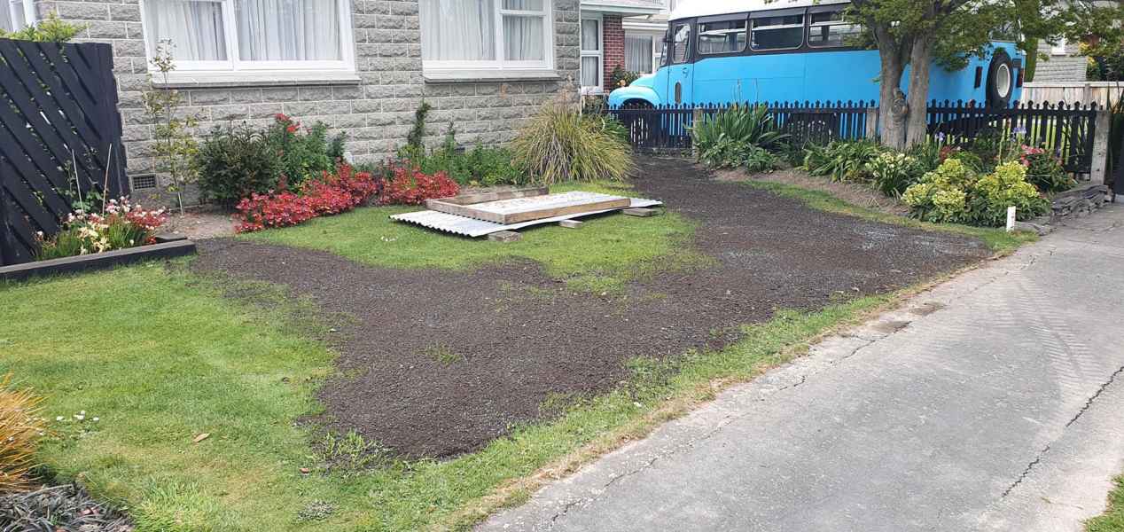 Front lawn reinstated with fresh topsoil after a drainage job in Canterbury
