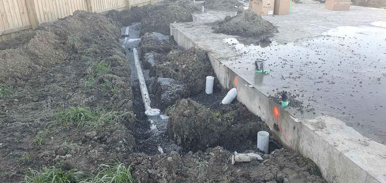 New stormwater and foul water drainage laid around a house slab in Christchurch