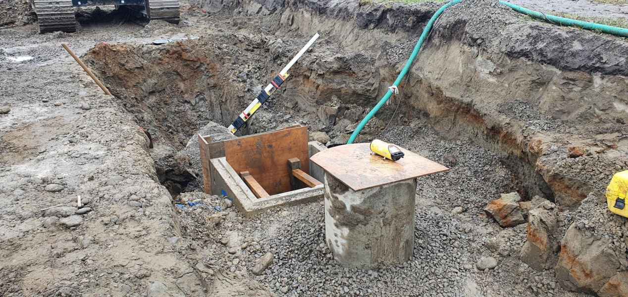Civil drainage chamber being built in an excavation in Canterbury