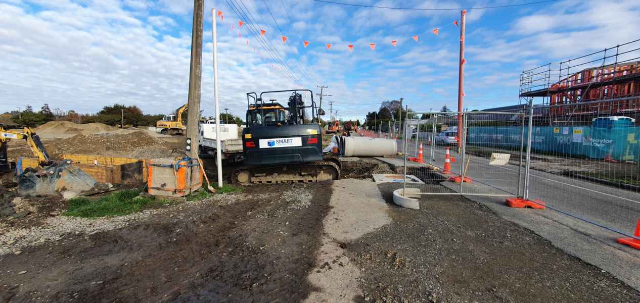 Smart Contracting excavator on a subdivision road drainage job in Canterbury